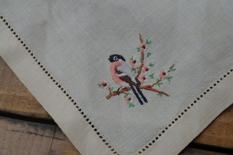 Vintage hand embroidered bird. Vintage linen.
